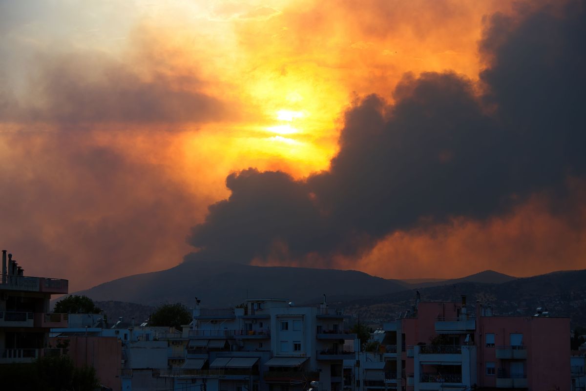 Moments of hell from the flames of the fire, Volos city, Greece