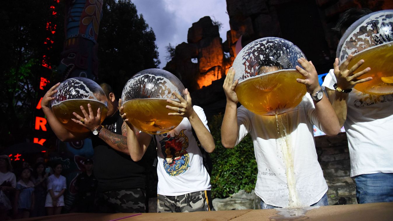 Drinking Beer With Fishbowl Competition In Hangzhou