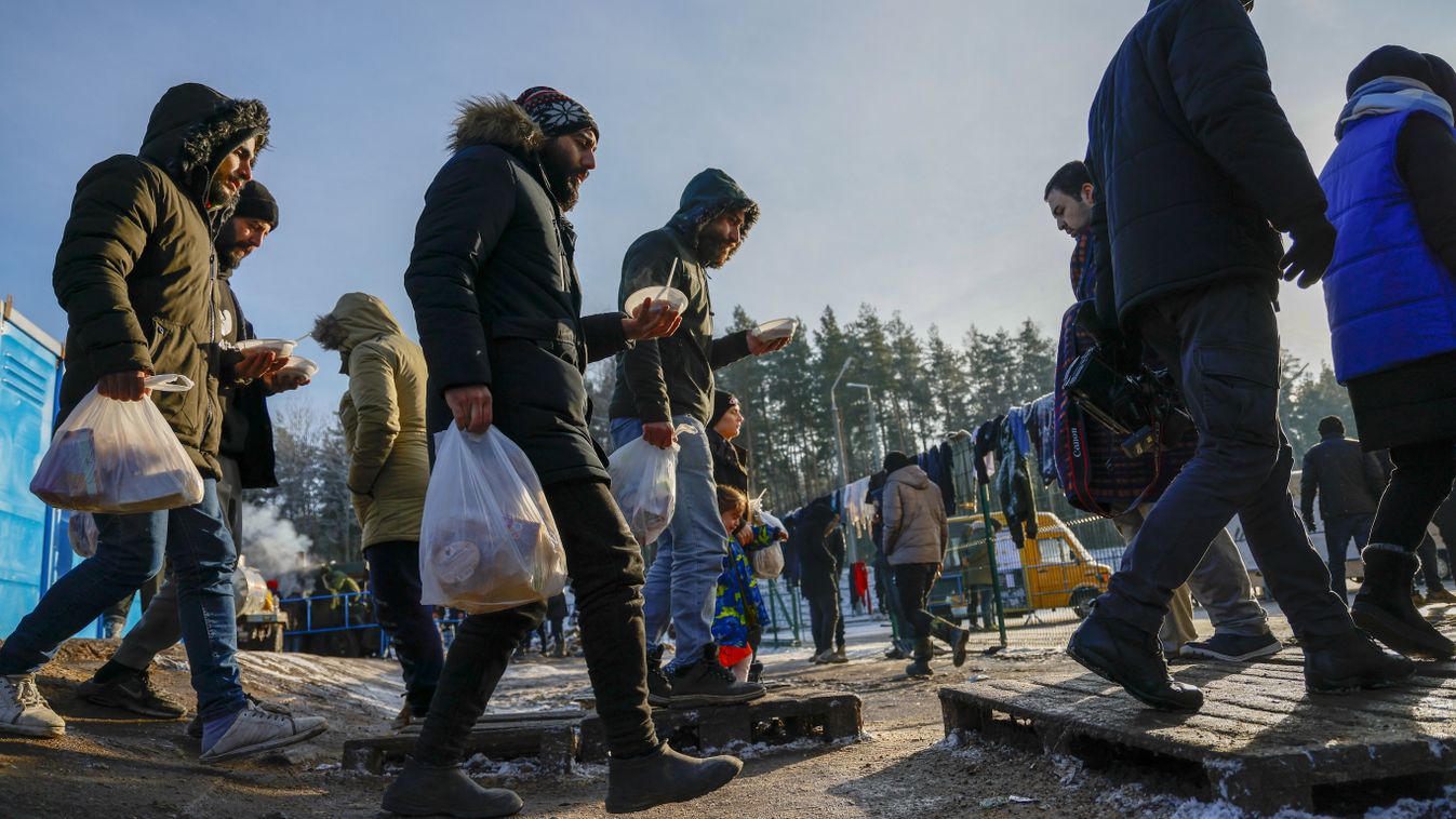 Migrants at Poland-Belarus border continue to wait at a closed area
