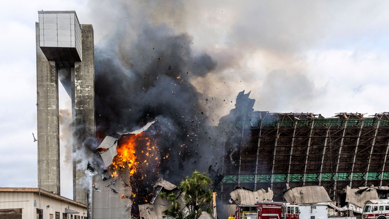 Massive fire burns through historic hangar at former air base in Tustin
