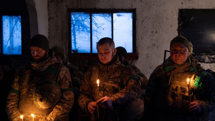 Ukrainian soldiers mark Christmas Eve near the frontline in Ukraine