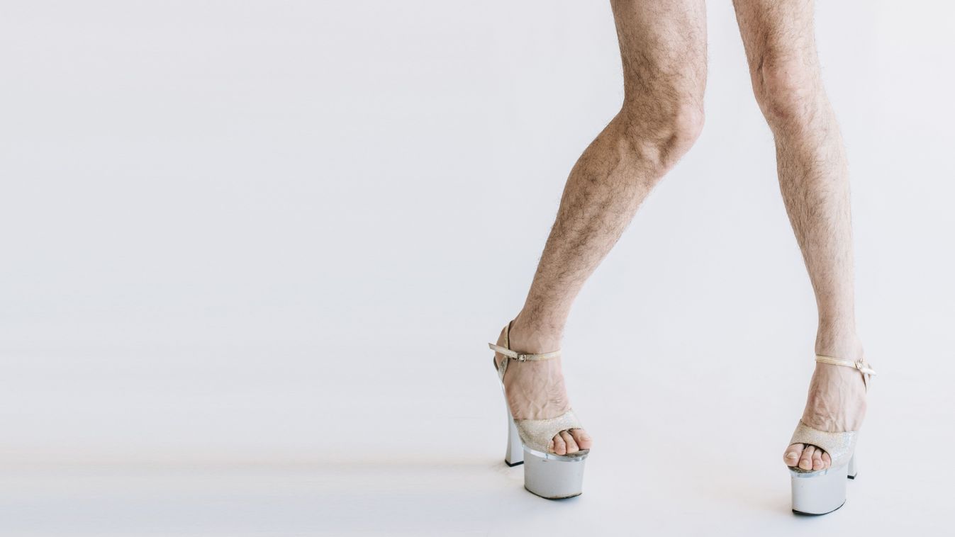 Cut,View,Of,Long,Curved,Legs,In,White,Woman's,Shoe