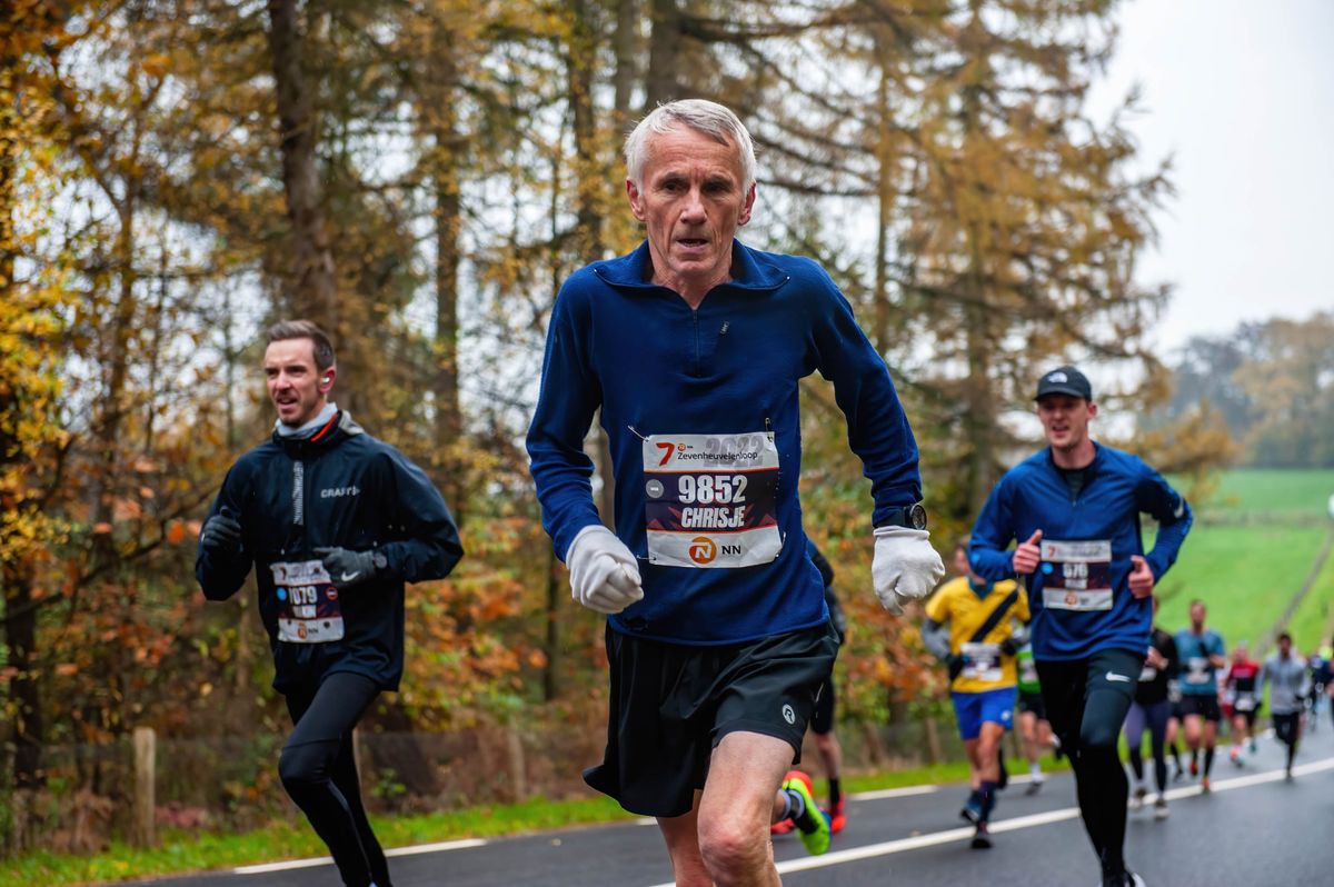 An old man is seen running the race