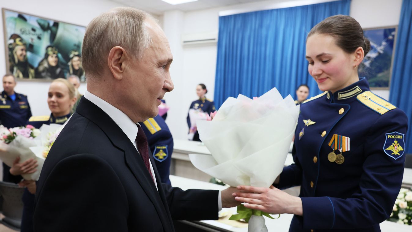 Russian President Putin visits military school of pilots in Krasnodar