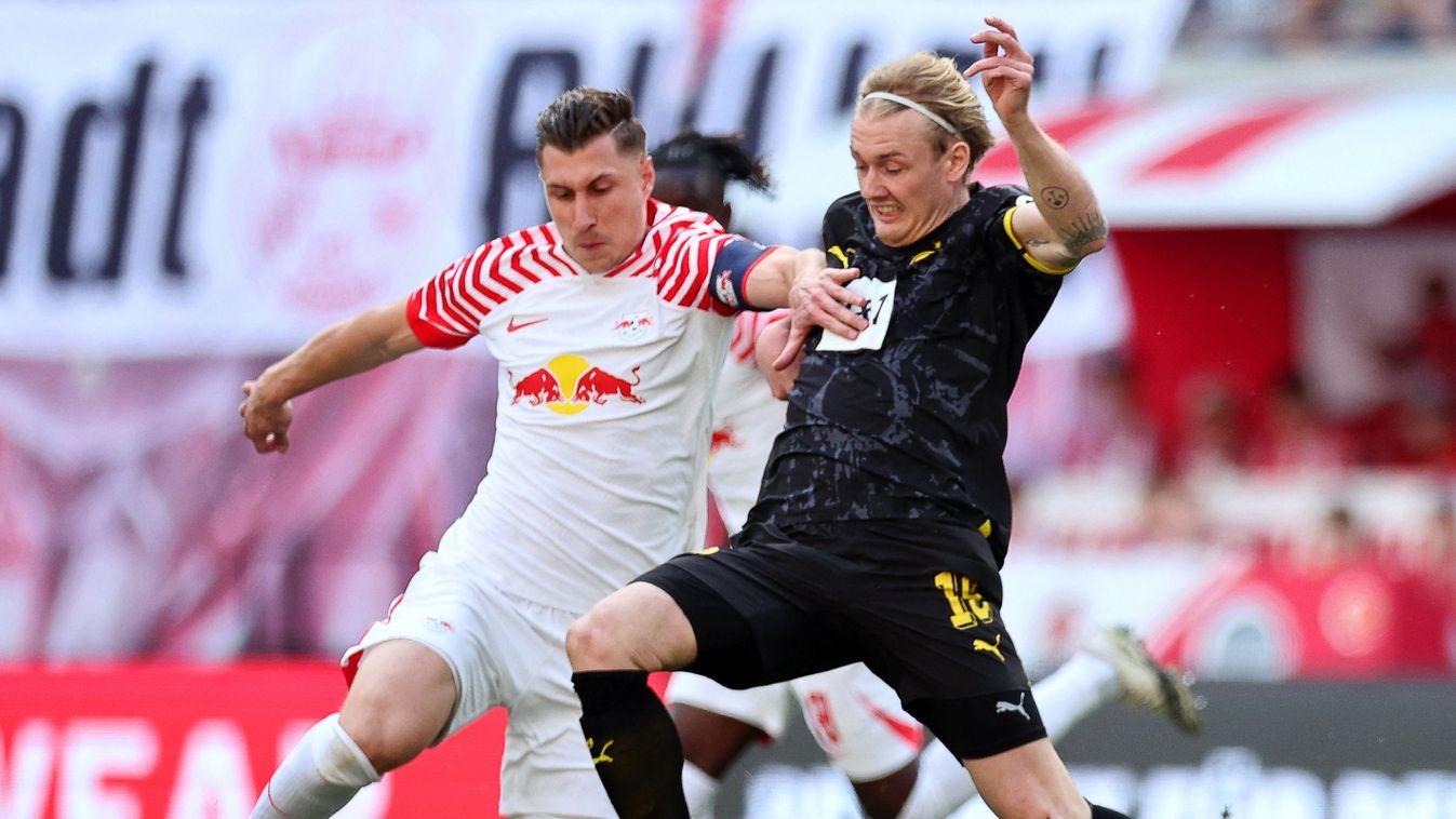 RB Leipzig - Borussia Dortmund27 April 2024, Saxony, Leipzig: Soccer: Bundesliga, RB Leipzig - Borussia Dortmund, Matchday 31, Red Bull Arena. Leipzig's Willi Orban (l) and Dortmund's Julian Brandt fight for the ball. IMPORTANT NOTE: In accordance with the regulations of the DFL German Football League and the DFB German Football Association, it is prohibited to use or have used photographs taken in the stadium and/or of the match in the form of sequential images and/or video-like photo series. Photo: Jan Woitas/dpa (Photo by JAN WOITAS / DPA / dpa Picture-Alliance via AFP)