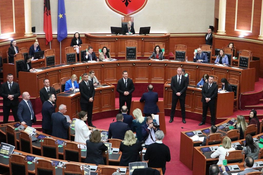 Albanian parliament approves deal to hold migrants for Italy