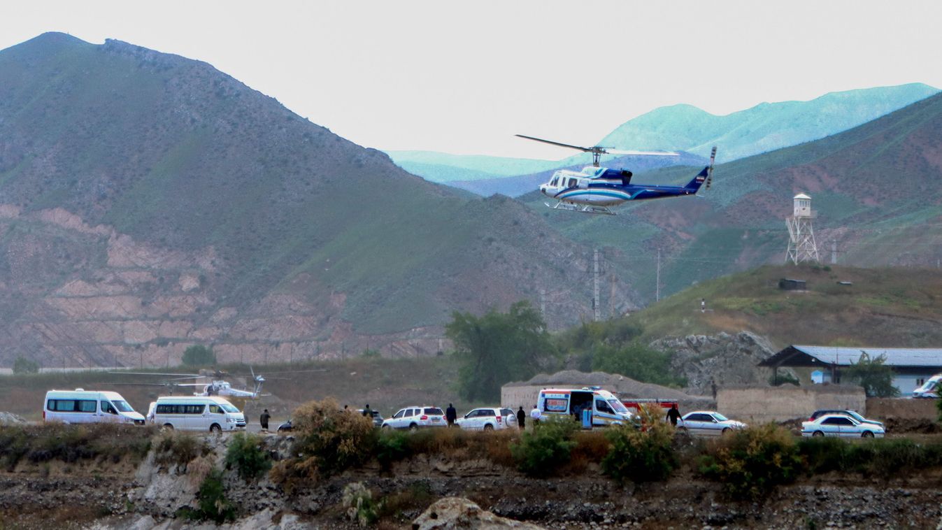 In this photo provided by Islamic Republic News Agency IRNA on May 19, 2024, shows the helicopter carrying Iran's President Ebrahim Raisi taking off at the Iranian border with Azerbaijan after the inauguration of the dam of Qiz Qalasi, in Aras. A helicopter in the convoy of the Iranian president was involved in "an accident" in East Azerbaijan province on May 19, state televsion reported, without specifying if the president was on board. (Photo by Ali Hamed HAGHDOUST / IRNA / AFP)