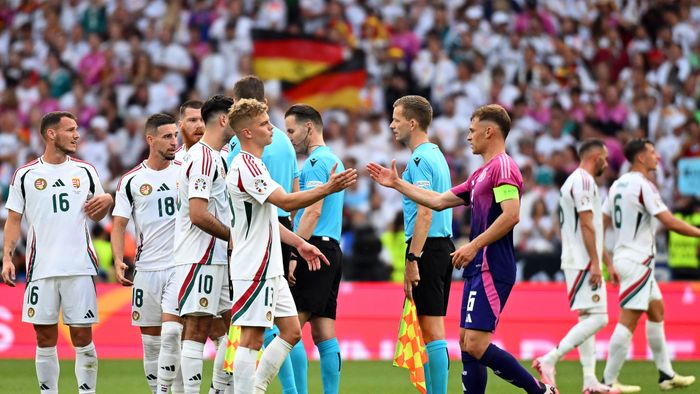 Euro 2024: Germany - Hungary
19 June 2024, Baden-Württemberg, Stuttgart: Soccer, UEFA Euro 2024, European Championship, Germany - Hungary, Preliminary round, Group A, Matchday 2, Stuttgart Arena, Hungary's András Schäfer (center l) and Germany's Joshua Kimmich (center r) shake hands after the final whistle. Photo: Marijan Murat/dpa (Photo by MARIJAN MURAT / DPA / dpa Picture-Alliance via AFP)