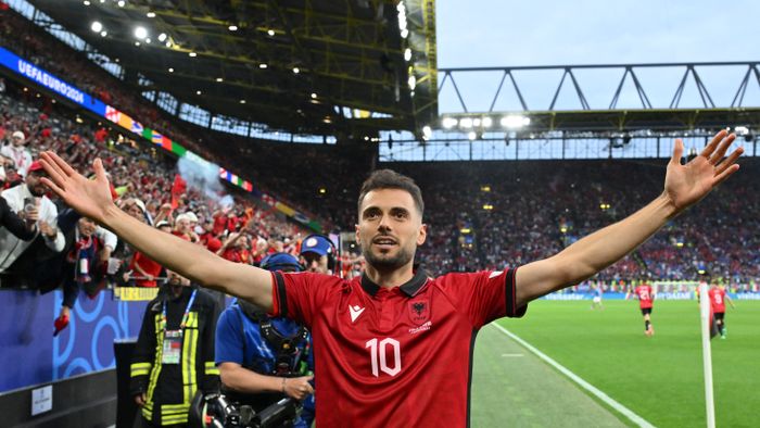 Football: UEFA Euro 2024 - 1st round day 1: Group B Italy v Albania
Albania's midfielder #10 Nedim Bajrami celebrates scoring his team's first goal during the UEFA Euro 2024 Group B football match between Italy and Albania at the BVB Stadion in Dortmund on June 15, 2024. (Photo by Alberto PIZZOLI / AFP)