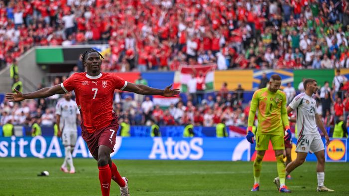 Euro 2024: Hungary - Switzerland
15 June 2024, North Rhine-Westphalia, Cologne: Soccer, European Championship, Hungary - Switzerland, Preliminary round, Group A, Matchday 1, Cologne Stadium, Breel Embolo of Switzerland celebrates after his goal for 1-3. Photo: Marius Becker/dpa (Photo by MARIUS BECKER / DPA / dpa Picture-Alliance via AFP)