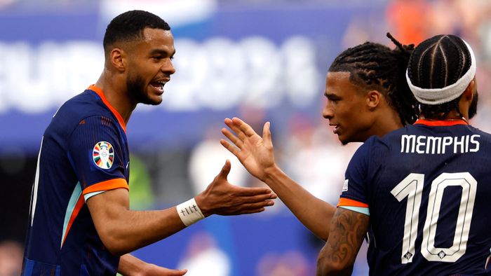 Football: UEFA Euro 2024 - 1st round day 1: Group D Poland v Netherlands
Netherlands' forward #11 Cody Gakpo (L) celebrates with Netherlands' defender #05 Nathan Ake (2nd R) and Netherlands' forward #10 Memphis Depay (R) after scoring his team's first goal during the UEFA Euro 2024 Group D football match between Poland and the Netherlands at the Volksparkstadion in Hamburg on June 16, 2024. (Photo by Odd ANDERSEN / AFP)