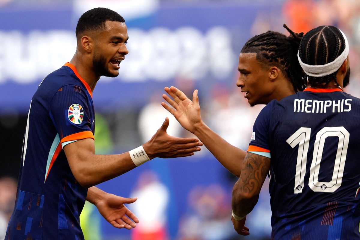 Football: UEFA Euro 2024 - 1st round day 1: Group D Poland v Netherlands
Netherlands' forward #11 Cody Gakpo (L) celebrates with Netherlands' defender #05 Nathan Ake (2nd R) and Netherlands' forward #10 Memphis Depay (R) after scoring his team's first goal during the UEFA Euro 2024 Group D football match between Poland and the Netherlands at the Volksparkstadion in Hamburg on June 16, 2024. (Photo by Odd ANDERSEN / AFP)