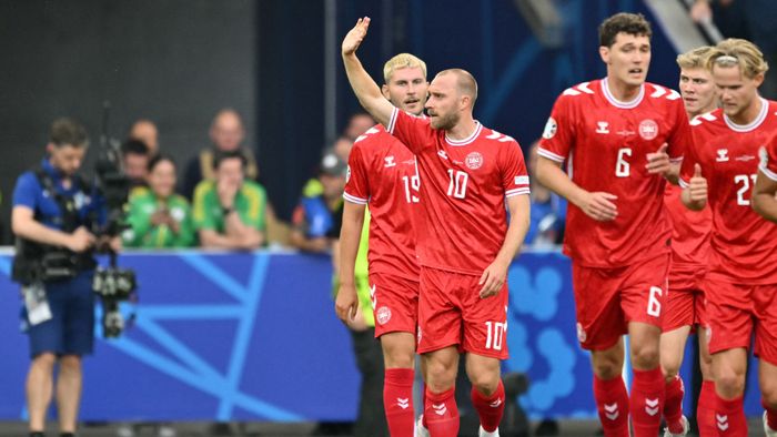 Football: UEFA Euro 2024 - 1st round day 1: Group C Slovenia v Denmark
Denmark's midfielder #10 Christian Eriksen (C) celebrates with teammates after scoring his team's first goal during the UEFA Euro 2024 Group C football match between Slovenia and Denmark at the Stuttgart Arena in Stuttgart on June 16, 2024. (Photo by MIGUEL MEDINA / AFP)