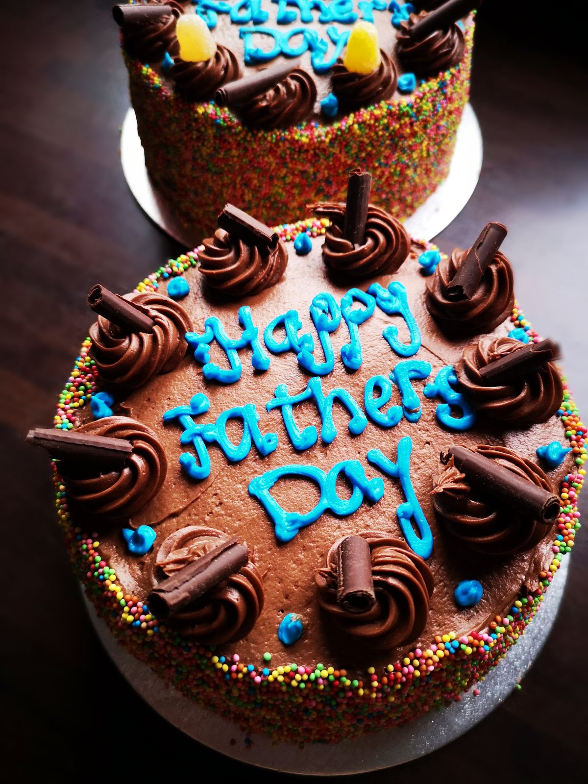 Happy Father's Day chocolate cake with blue writing