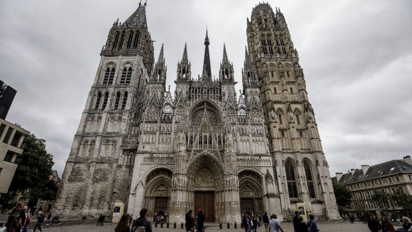 (FILES) A picture shows the Notre-Dame de Rouen cathedral in Rouen, northwestern France, on July 4, 2020. A fire is "in progress" on the spire of the Rouen cathedral, northern France, the Rouen town hall announced on July 11, 2024. (Photo by Sameer Al-DOUMY / AFP)