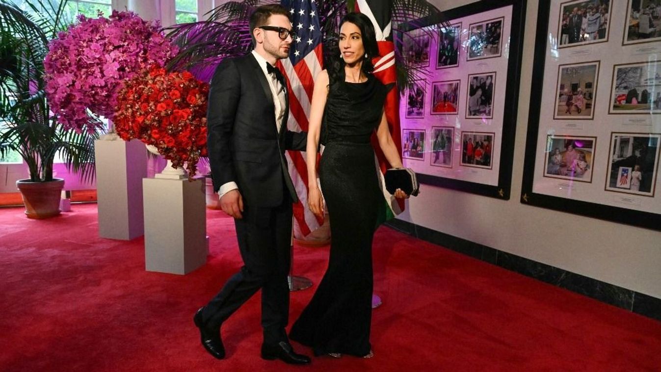 US historian Alex Soros and political staffer Huma Abedin arrives at the Booksellers Room of the White House on the occasion of the State Dinner with the Kenyan president at the White House in Washington, DC, on May 23, 2024. (Photo by SAUL LOEB / AFP)