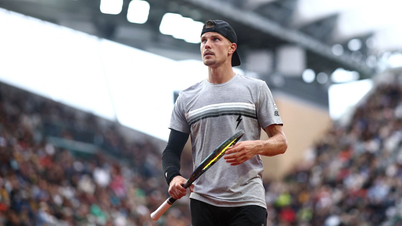 Fucsovics Márton after a point during his men's singles match against Greece's Stefanos Tsitsipas on Court Suzanne-Lenglen on day two of the French Open tennis tournament at the Roland Garros Complex in Paris on May 27, 2024. (Photo by Anne-Christine POUJOULAT / AFP)