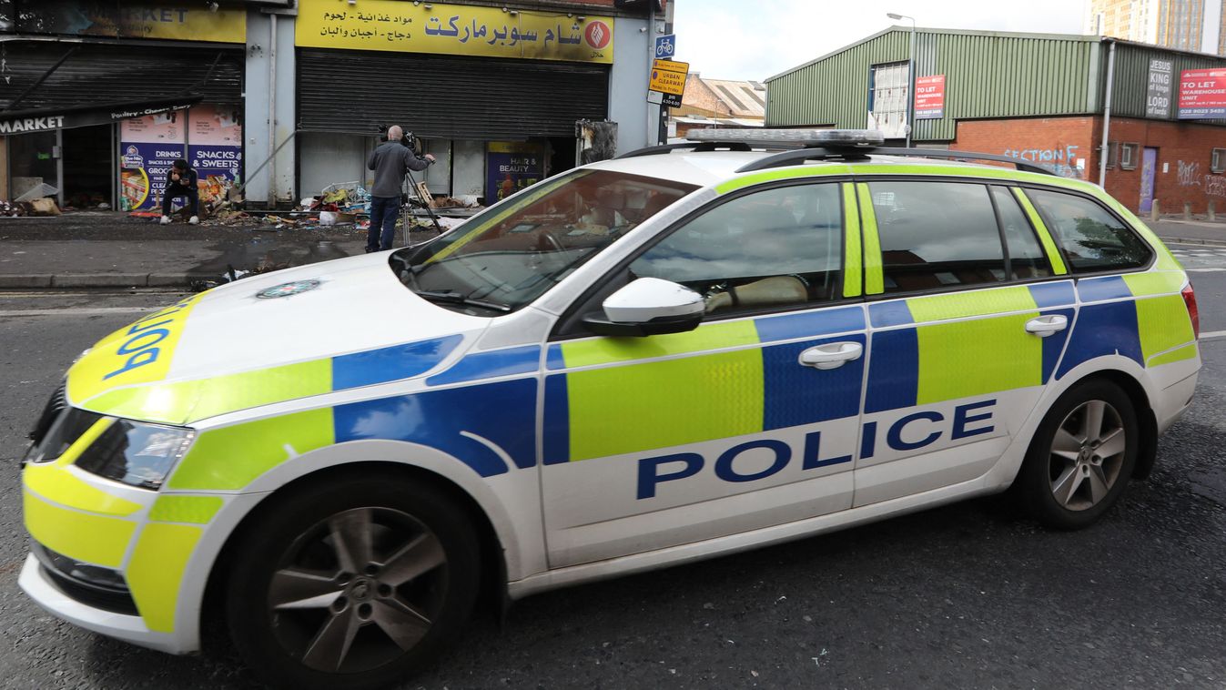 Racist attacks continue in Belfast
BELFAST, NORTHERN IRELAND - AUGUST 6: A police car passes by a destroyed local business as supporters of anti-immigration attacks continue in Belfast, Northern Ireland on August 6, 2024. Conor Mccaughley / Anadolu (Photo by Conor Mccaughley / ANADOLU / Anadolu via AFP)