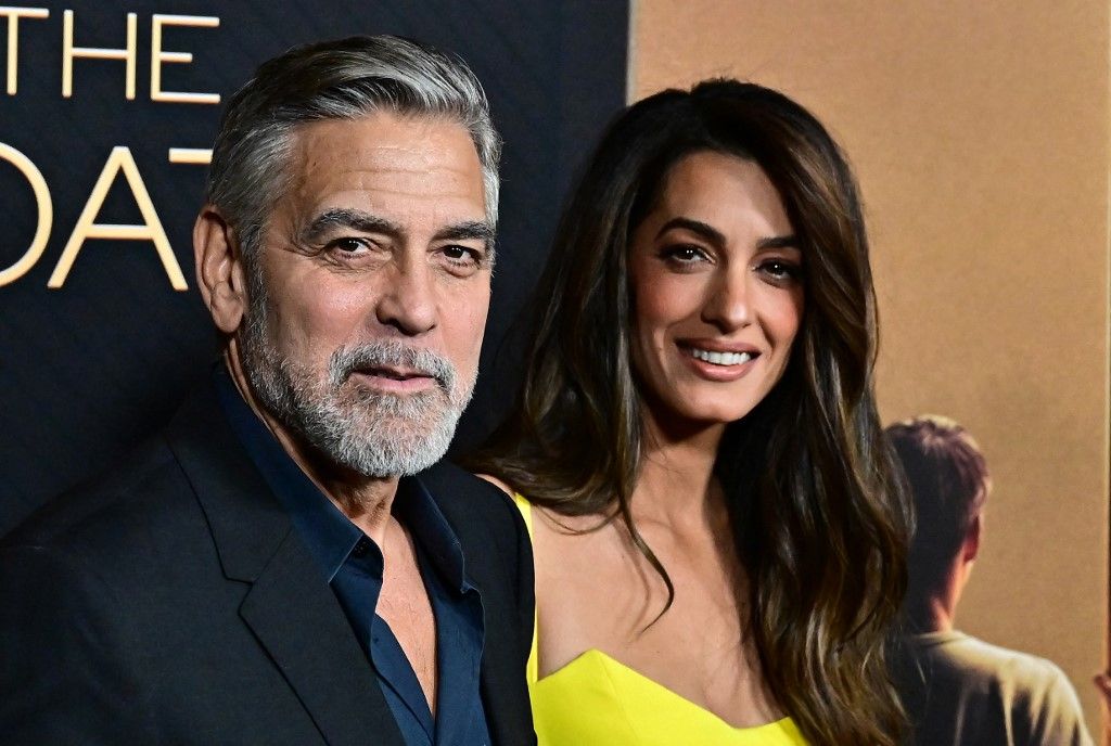 George Clooney amerikai színész és felesége, libanoni-brit ügyvéd, Amal Clooney részt vesz az Amazon MGM Studios "The Boys in the boat" című filmjének Los Angeles-i premierjén a Samuel Goldwyn színházban, Beverly Hillsben, Kaliforniában, 2023. december 11-én.