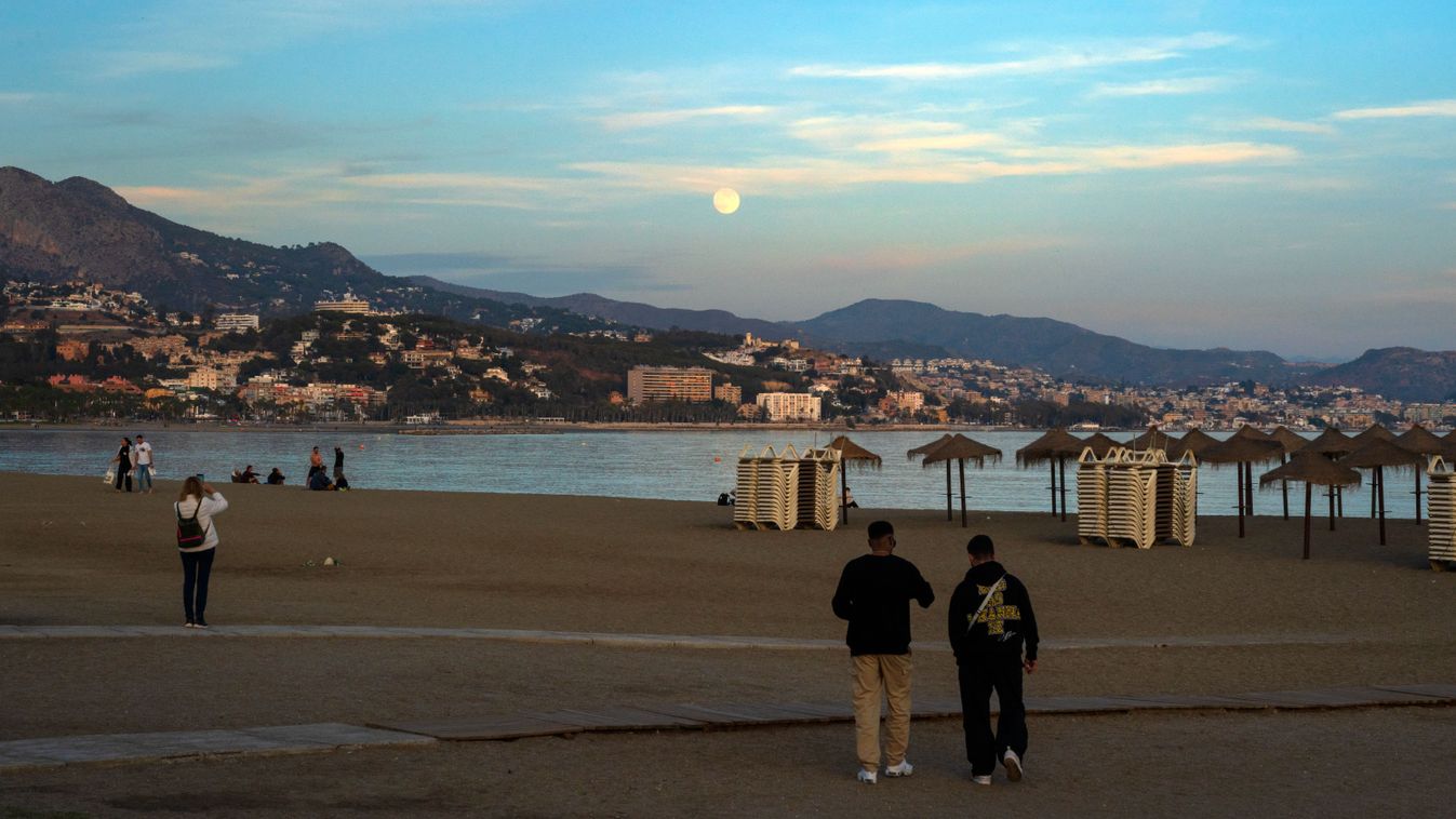 Daily Life In Malaga
A view of Malagueta Beach, situated in the center of Malaga, Spain, is shown here. This urban beach, featuring dark sand, lies on the eastern coast of the city, close to the port of Malaga. It stretches approximately 1,200 meters in length and averages around 45 meters in width. (Photo by Joaquin Gomez Sastre/NurPhoto) (Photo by Joaquin Gomez Sastre / NurPhoto / NurPhoto via AFP)