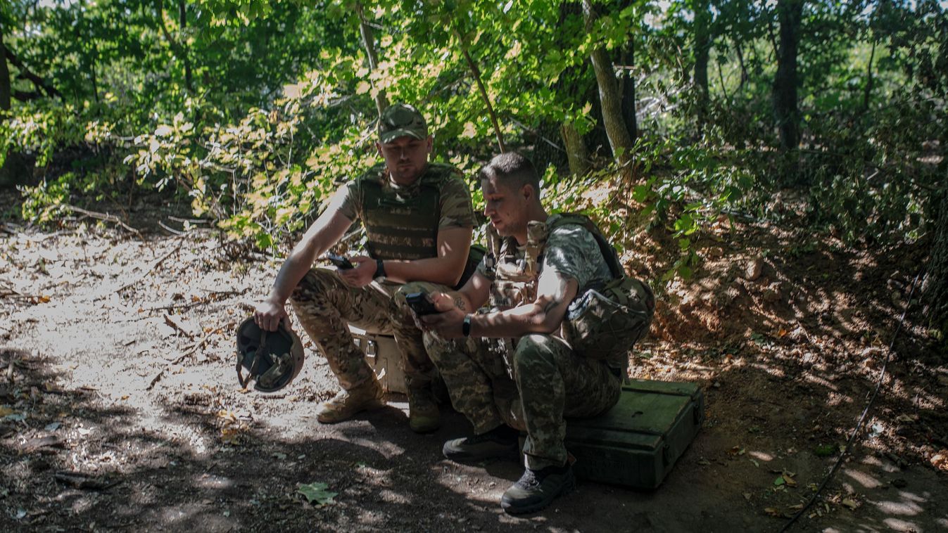 Ukrainian army's military operation in the direction of Kupiansk area in Kharkiv Oblast
KUPIANSK AREA, UKRAINE - AUGUST 13: Soldiers from the 116th Brigade operate with the 2S1 'Gvozdika' self-propelled howitzer in the direction of Kupiansk area in Kharkiv oblast, Ukraine, on August 13, 2024. Despite the preparations, the operation is on hold as the commander waits for a clear sky, indicating that Russian drones are patrolling the area in search of Ukrainian artillery positions. Gian Marco Benedetto / Anadolu (Photo by Gian Marco Benedetto / ANADOLU / Anadolu via AFP)