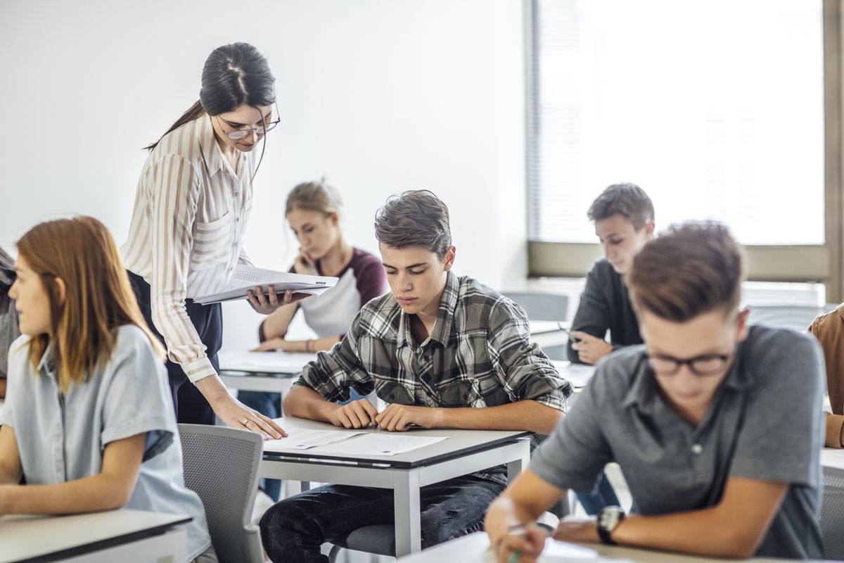 Group,Of,High,School,Students,Doing,Exam,At,Classroom.