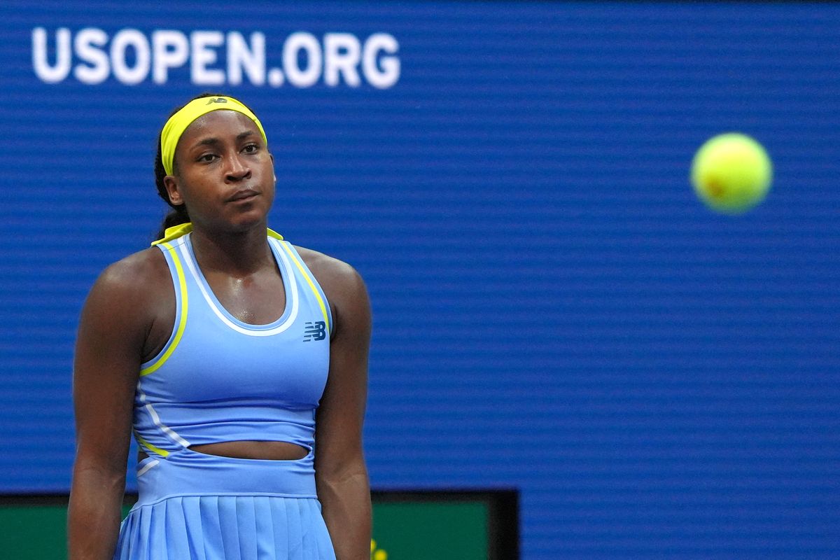 USA's Coco Gauff reacts during her women's singles round of 16 tennis match against USA's Emma Navarro on day seven of the US Open tennis tournament at the USTA Billie Jean King National Tennis Center in New York City, on September 1, 2024. (Photo by TIMOTHY A. CLARY / AFP)