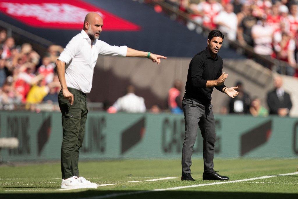 Manchester City v Arsenal - The FA Community Shield
Mikel Arteta of Arsenal and Pep Guardiola of Manchester City gestures during the FA Community Shield match between Arsenal and Manchester City at Wembley Stadium, London on Sunday 6th August 2023. (Photo by Federico Guerra Maranesi/MI News/NurPhoto) (Photo by MI News / NurPhoto / NurPhoto via AFP)