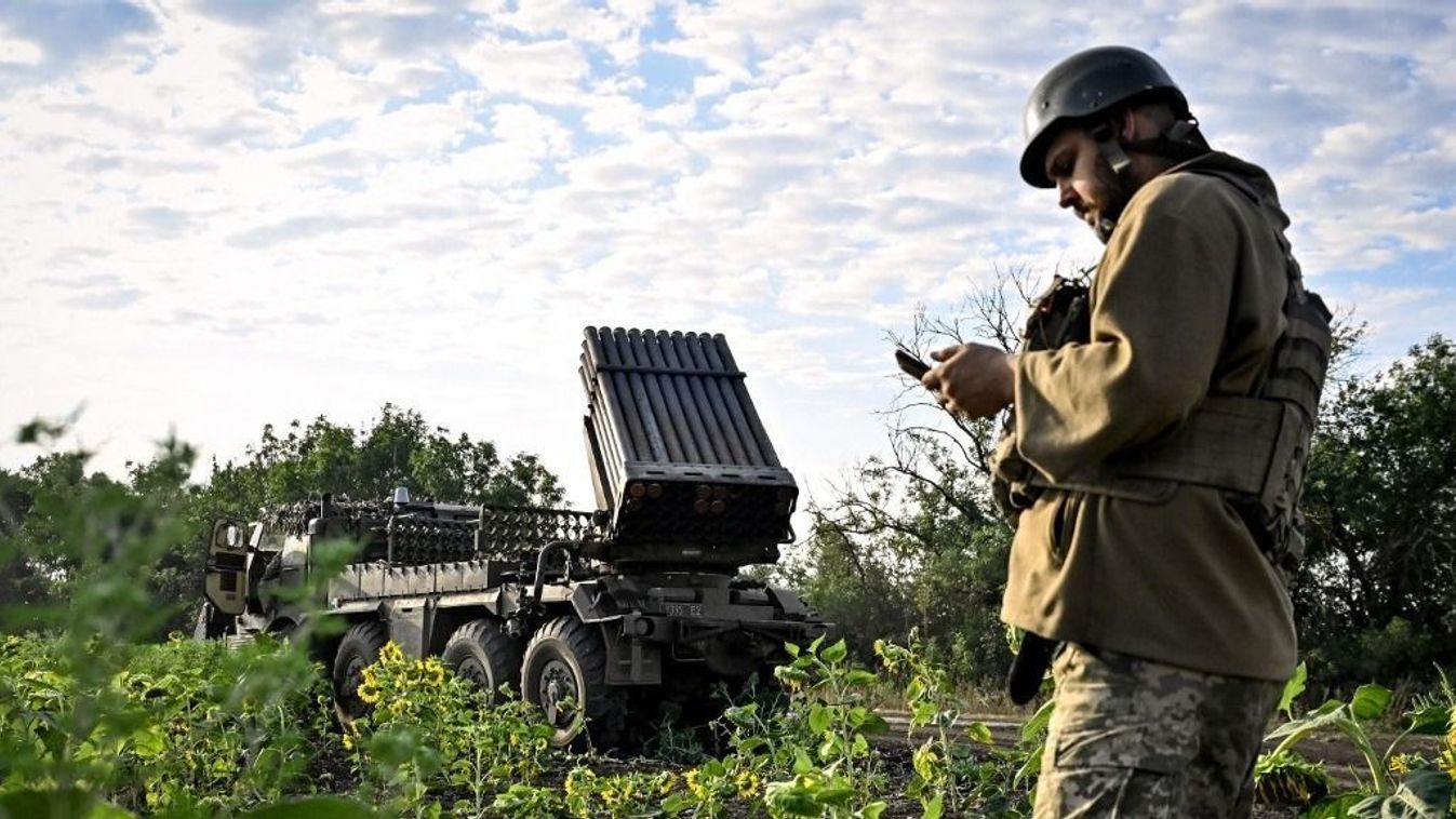 Ukrainian artillerymen fire multiple rocket launcher in Donetsk region