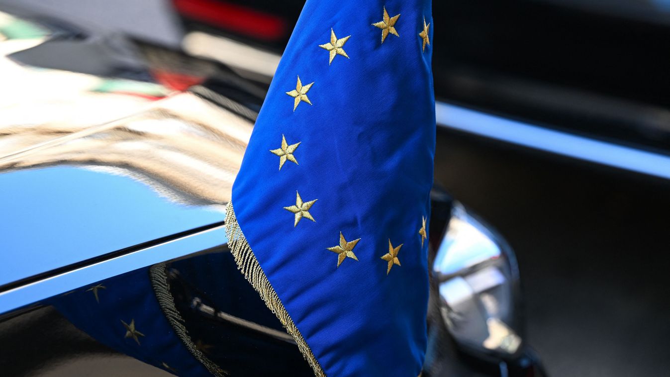 Paris Celebrates Bastille Day 2024
PARIS, FRANCE - JULY 14:   
Flag of the European Union seen on the EU Ambassador's vehicle parked near Avenue Foch in Paris, during the Bastille Day military parade, on July 14, 2024. (Photo by Artur Widak/NurPhoto) (Photo by Artur Widak / NurPhoto / NurPhoto via AFP)