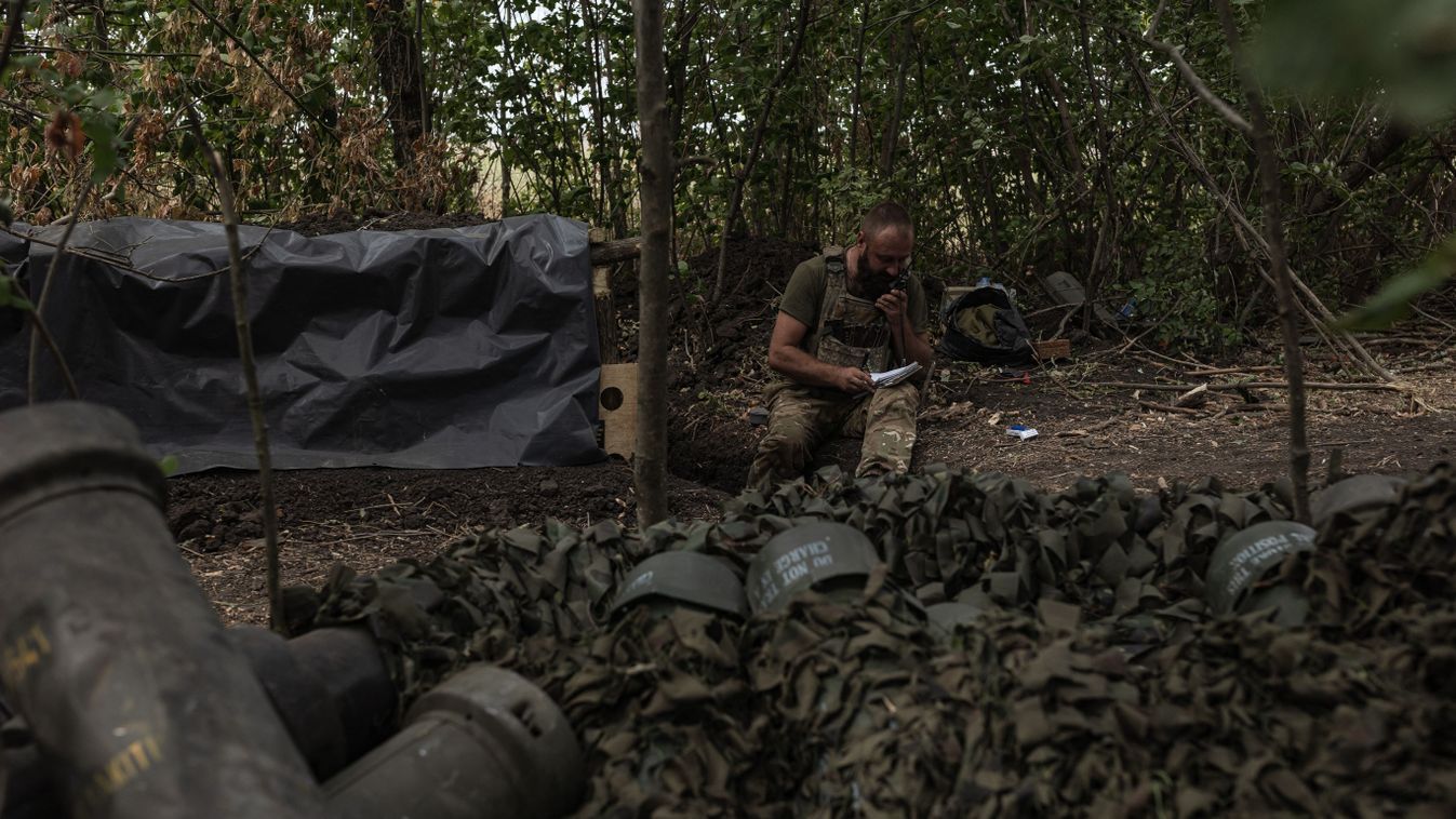 Military mobility of Ukrainian soldiers continue in the direction of Marinka
MARINKA, DONETSK OBLAST, UKRAINE - AUGUST 29: Ukrainian soldier receives firing coordinates as military mobility of Ukrainian soldiers continue in the direction of Marinka, Donetsk Oblast, Ukraine on August 29, 2024. Diego Herrera Carcedo / Anadolu (Photo by Diego Herrera Carcedo / ANADOLU / Anadolu via AFP)