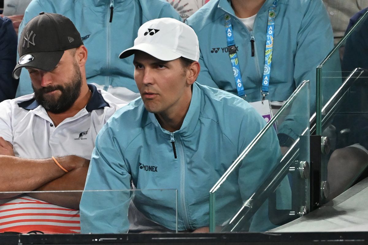 The coach of Kazakhstan's Jelena Ribakina, Stefano Vukov, supports her from the players box as she competes against Belarus' Victoria Azarenka during their women's singles semi-final match on day eleven of the Australian Open tennis tournament in Melbourne on January 26, 2023. (Photo by Paul CROCK / AFP) / -- IMAGE RESTRICTED TO EDITORIAL USE - STRICTLY NO COMMERCIAL USE --