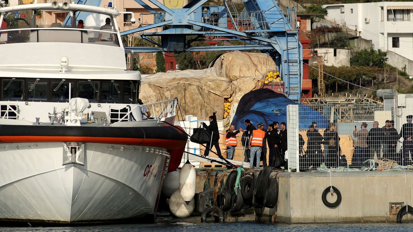 A group of migrants embark on an Italian coast guard ship at Shengjin port in Albania on October 19, 2024. Twelve Bangladeshi and Egyptian men left Albania for Italy on October 19, 2024 after judges ruled against their detention in the non-EU nation under a controversial deal between Rome and Tirana. Sixteen men from Bangladesh and Egypt arrived at the Albanian port of Shengjin on October 16, nearly a year after an agreement to house asylum seekers in Italian-run centres in Albania until their cases are handled remotely by Italian judges. (Photo by Adnan Beci / AFP)