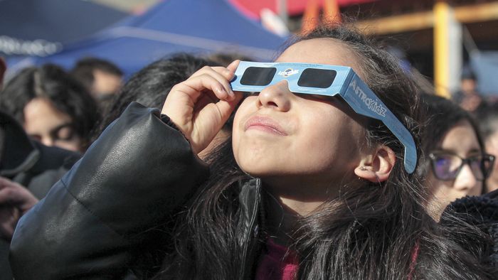 Solar eclipse in Chile
COYHAIQUE, CHILE - OCTOBER 02: People use special glasses to observe a solar eclipse in Coyhaique, Chile, on October 02, 2024. Part of the southern hemisphere witnessed an annular eclipse on Wednesday that occurred when the Moon almost completely covered the Sun, a spectacle that was seen from Chilean and Argentine Patagonia. Lucas Aguayo Araos / Anadolu (Photo by Lucas Aguayo Araos / ANADOLU / Anadolu via AFP)