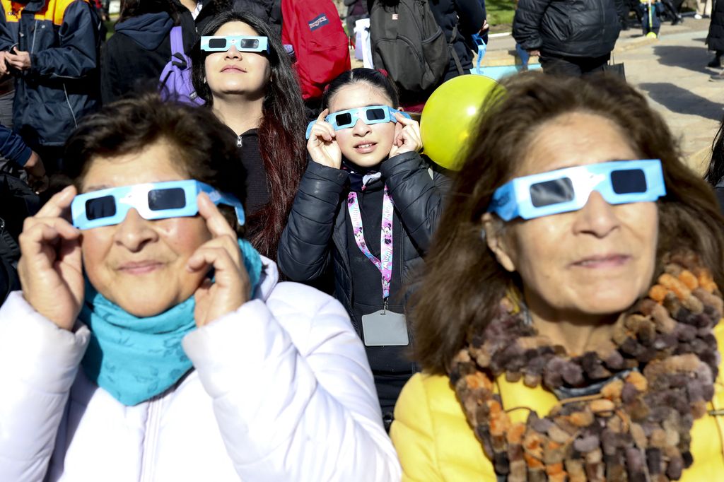 Solar eclipse in Chile
COYHAIQUE, CHILE - OCTOBER 02: People use special glasses to observe a solar eclipse in Coyhaique, Chile, on October 02, 2024. Part of the southern hemisphere witnessed an annular eclipse on Wednesday that occurred when the Moon almost completely covered the Sun, a spectacle that was seen from Chilean and Argentine Patagonia. Lucas Aguayo Araos / Anadolu (Photo by Lucas Aguayo Araos / ANADOLU / Anadolu via AFP)