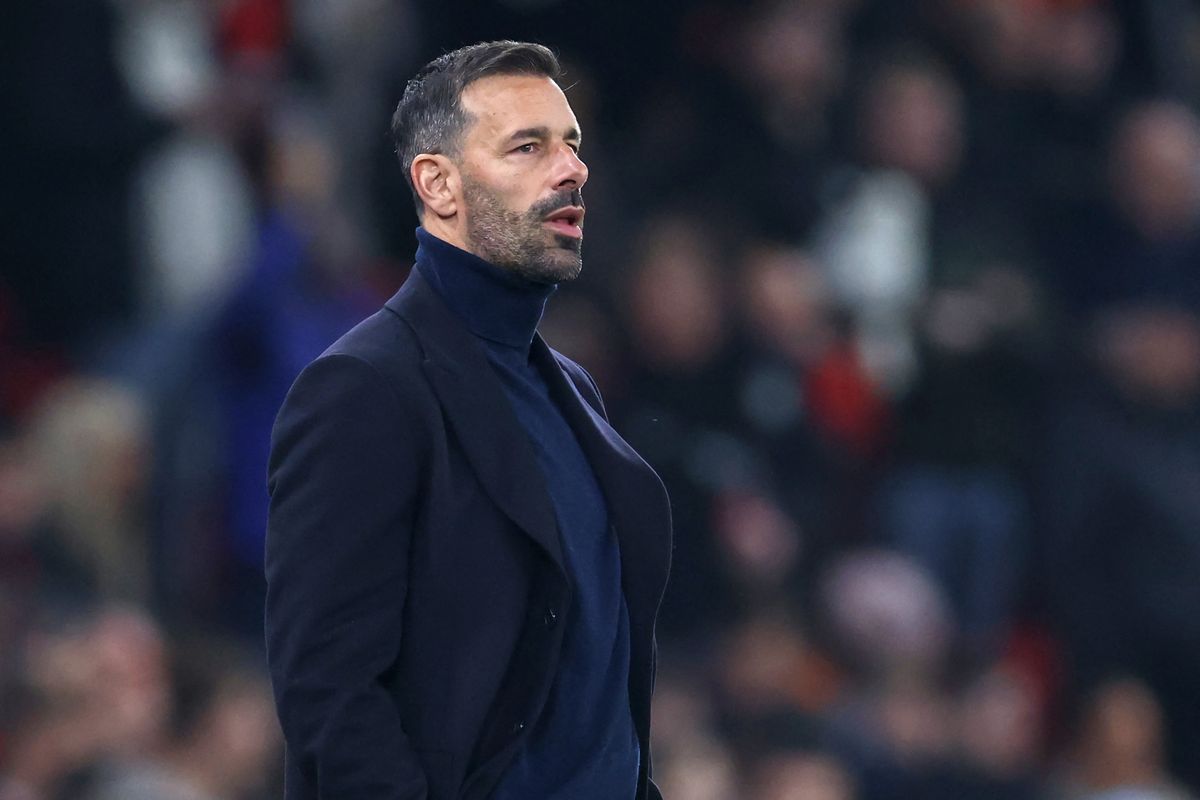 Manchester United Dutch interim head coach Ruud van Nistelrooy Rúben Amorim looks on ahead of kick-off in the English League Cup round of 16 football match between Manchester United and Leicester City at Old Trafford in Manchester, north west England, on October 30, 2024. (Photo by Darren Staples / AFP) / RESTRICTED TO EDITORIAL USE. No use with unauthorized audio, video, data, fixture lists, club/league logos or 'live' services. Online in-match use limited to 120 images. An additional 40 images may be used in extra time. No video emulation. Social media in-match use limited to 120 images. An additional 40 images may be used in extra time. No use in betting publications, games or single club/league/player publications. / 