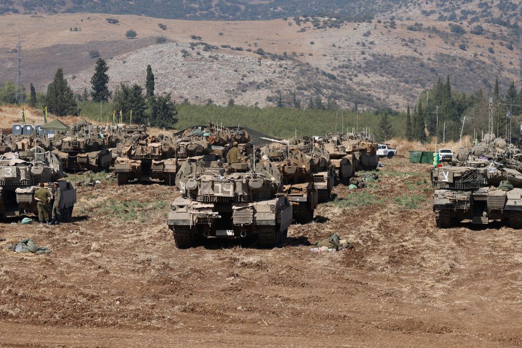 Israeli troops deploy in an area in the Upper Galilee region in northern Israel on September 27, 2024. Israel rejected a push by allies for a 21-day ceasefire in Lebanon and vowed to keep fighting Hezbollah militants "until victory", ahead of Prime Minister Benjamin Netanyahu's expected address to the UN General Assembly on September 27. (Photo by Jalaa MAREY / AFP)