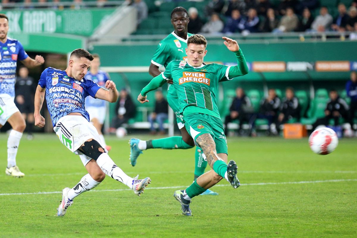 VIENNA, AUSTRIA - OCTOBER 20: Donis Avdijaj of Hartberg and Bendeguz Bolla of Rapid during the Admiral Bundesliga match between SK Rapid and TSV Egger Glas Hartberg at Allianz Stadion on October 20 2024 in Vienna, Austria.241020_SEPA_29_023 - 20241020_PD13513 (Photo by Thomas Pichler / APA-PictureDesk / APA-PictureDesk via AFP) Bolla Bendegúz Konferencialiga