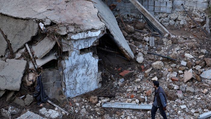 A man seeks a missing relative following deadly floods in Letur, southwest of Valencia, eastern Spain, on October 30, 2024. Floods triggered by torrential rains in Spain's eastern Valencia region has left at least 70 people dead, rescue services said on October 30. (Photo by OSCAR DEL POZO / AFP)