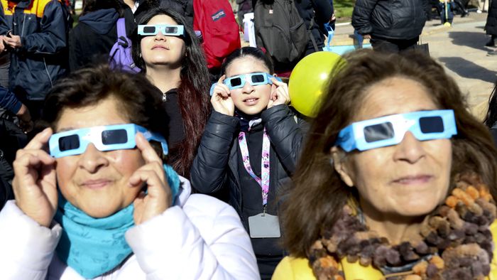 Solar eclipse in Chile
COYHAIQUE, CHILE - OCTOBER 02: People use special glasses to observe a solar eclipse in Coyhaique, Chile, on October 02, 2024. Part of the southern hemisphere witnessed an annular eclipse on Wednesday that occurred when the Moon almost completely covered the Sun, a spectacle that was seen from Chilean and Argentine Patagonia. Lucas Aguayo Araos / Anadolu (Photo by Lucas Aguayo Araos / ANADOLU / Anadolu via AFP)