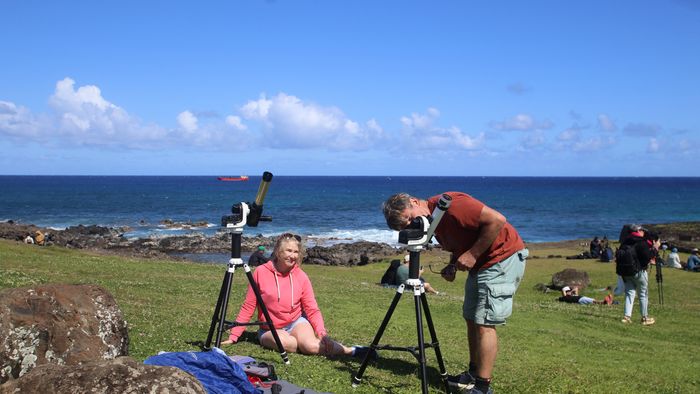 Residents and tourists prepare to view the annular solar eclipse at Isla de Pascua in the Pacific Ocean, Chile, on October 2, 2024. Part of the southern hemisphere will witness this Wednesday an annular eclipse that will occur when the Moon almost totally covers the Sun, leaving a luminous ring visible, a spectacle that will be seen in its maximum splendor from the Chilean and Argentinean Patagonia. (Photo by Jonathan MARTINS / AFP)