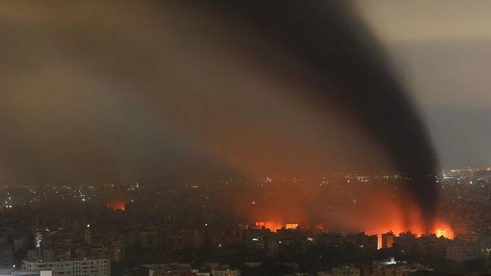 Smoke rises from the site of an Israeli airstrike that targeted a neighborhood in Beirut’s southern suburb late October 6, 2024. Official Lebanese media reported four Israeli strikes on south Beirut Sunday, shortly after calls by Israel's army for residents to evacuate the Hezbollah stronghold which has been bombarded for several days.
"Enemy warplanes launched two strikes on the southern suburbs, the first targeted the Saint Therese area, and the second targeted the Burj al-Barajneh area," Lebanon's National News Agency said. (Photo by STRINGER / AFP)