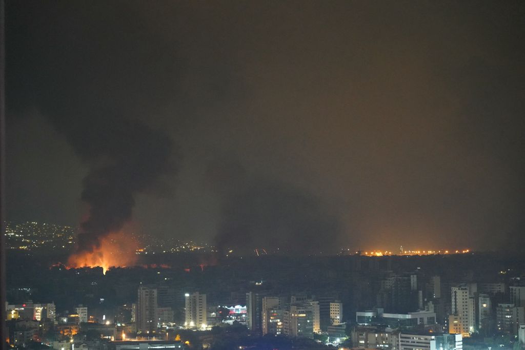 Smoke rises from the site of an Israeli airstrike that targeted a neighborhood in Beirut’s southern suburb late October 7, 2024. Official Lebanese media reported four Israeli strikes on south Beirut October 6, shortly after calls by Israel's army for residents to evacuate the Hezbollah stronghold -- bombarded for several days.
"Enemy warplanes launched two strikes on the southern suburbs, the first targeted the Saint Therese area, and the second targeted the Burj al-Barajneh area," Lebanon's National News Agency said. (Photo by ETIENNE TORBEY / AFP)