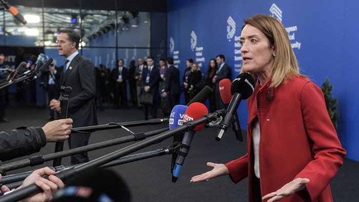 European Parliament President Roberta Metsola and NATO Secretary General Mark Rutte (back L) both give statesments as they arrive to attend the European Political Community Summit in Budapest, on November 7, 2024. (Photo by Ferenc ISZA / AFP)