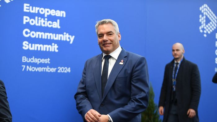 EuropeAustria's Chancellor Karl Nehammer arrives for the European Political Community Summit in Budapest, on November 7, 2024. (Photo by Ferenc ISZA / AFP)an Political Community summit