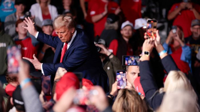 Former US President and Republican presidential candidate Donald Trump dances as he leaves after speaking at his last campaign rally at Van Andel Arena in Grand Rapids, Michigan on November 5, 2024. (Photo by JEFF KOWALSKY / AFP)