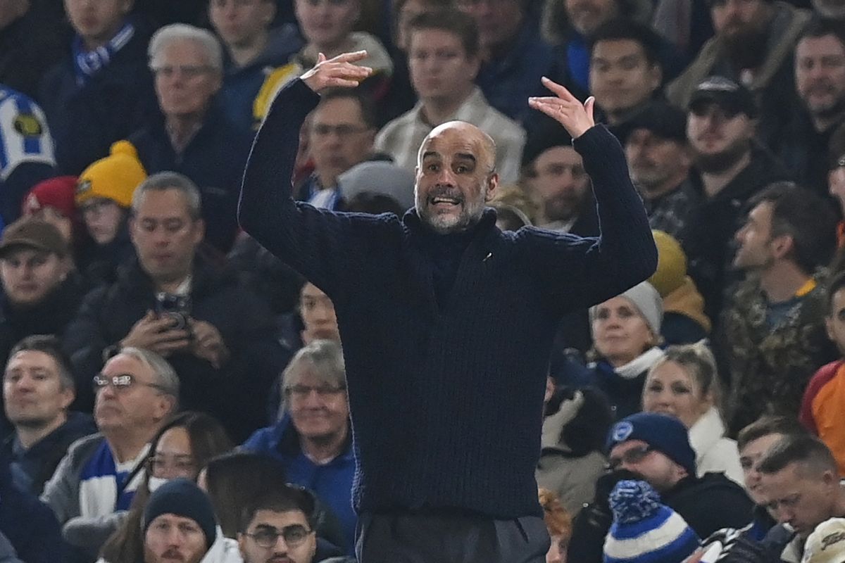 Manchester City's Spanish manager Pep Guardiola gestures on the touchline during the English Premier League football match between Brighton and Hove Albion and Manchester City at the American Express Community Stadium in Brighton, southern England on November 9, 2024. (Photo by Glyn KIRK / AFP) / RESTRICTED TO EDITORIAL USE. No use with unauthorized audio, video, data, fixture lists, club/league logos or 'live' services. Online in-match use limited to 120 images. An additional 40 images may be used in extra time. No video emulation. Social media in-match use limited to 120 images. An additional 40 images may be used in extra time. No use in betting publications, games or single club/league/player publications. /  brazil válogatott Ronaldo