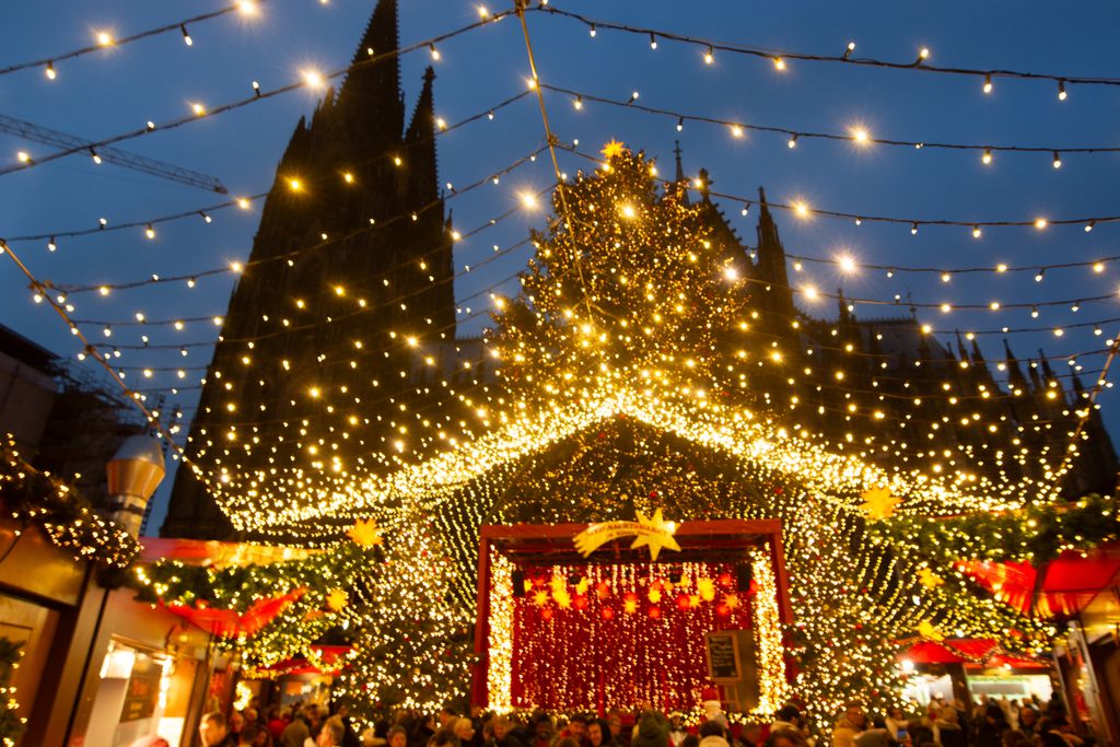 Christmas MarkVisitors check the stalls selling Christmas decorations at Cologne Christmas in front of Dam Cathedral in Cologne, Germany, on November 18, 2024. (Photo by Ying Tang/NurPhoto) (Photo by Ying Tang / NurPhoto / NurPhoto via AFP)et Opens In Cologne