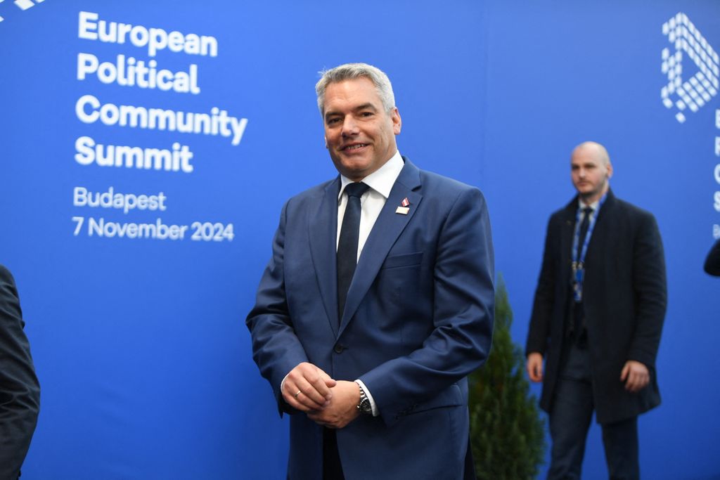 EuropeAustria's Chancellor Karl Nehammer arrives for the European Political Community Summit in Budapest, on November 7, 2024. (Photo by Ferenc ISZA / AFP)an Political Community summit