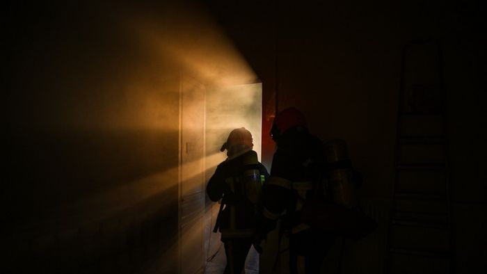A firefighter takes part in a fire safety training by the SDIS 01 firemen organisation in the castle Bouchet in Fareins, central-eastern France, on November 27, 2024. (Photo by OLIVIER CHASSIGNOLE / AFP)